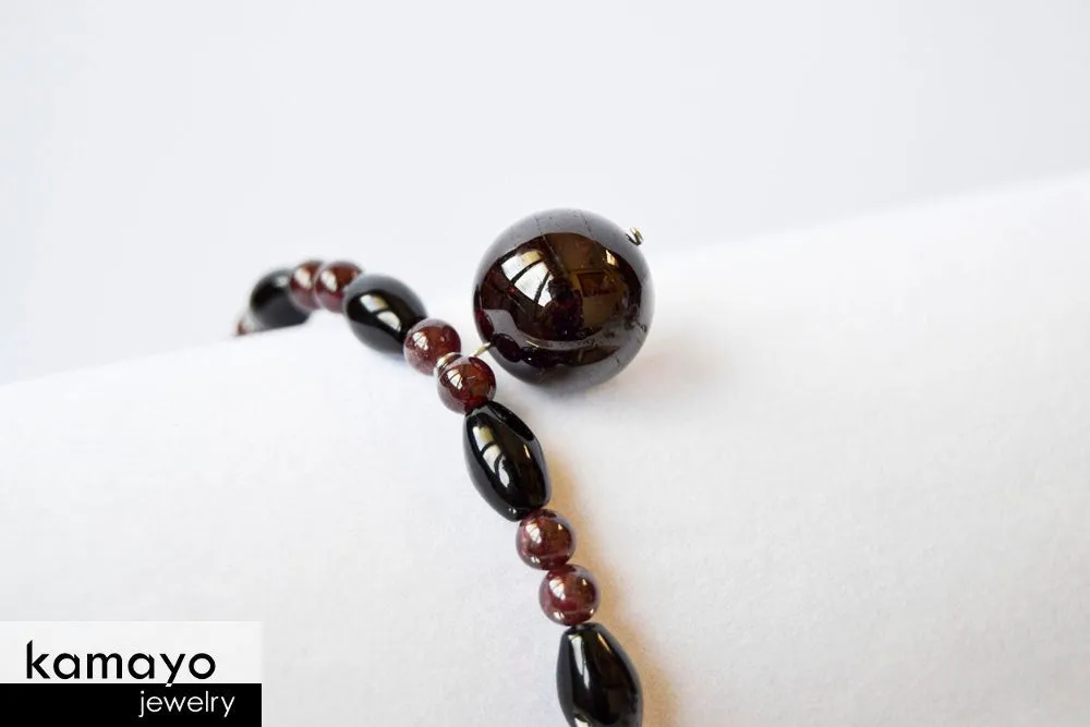 CAPRICORN BRACELET - Red Garnet Pendant and Black Onyx Beads