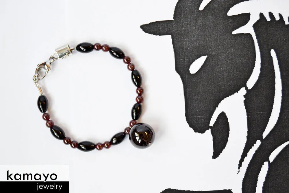 CAPRICORN BRACELET - Red Garnet Pendant and Black Onyx Beads