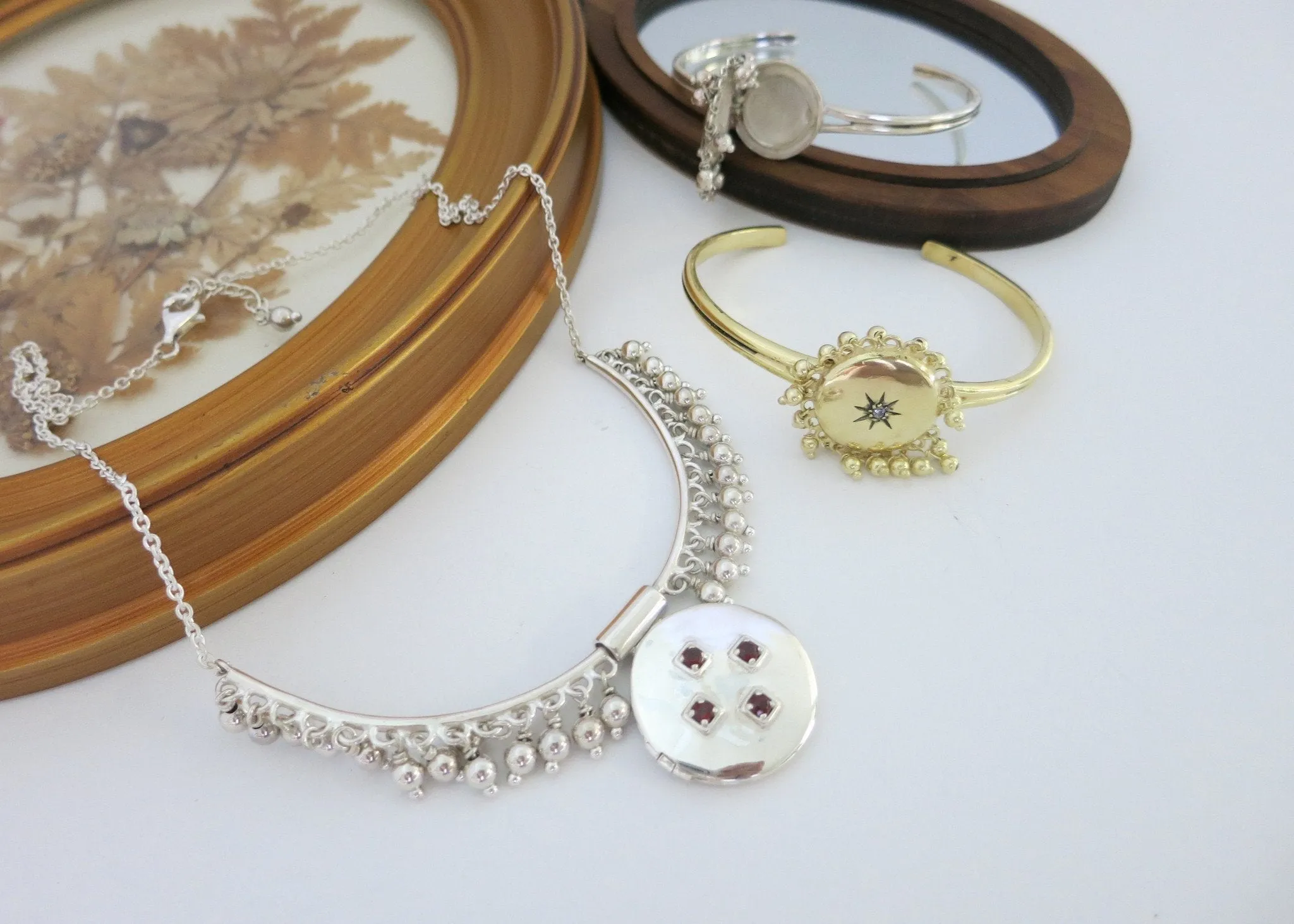 Elegant, vintage inspired, gold-plated brass round locket bracelet