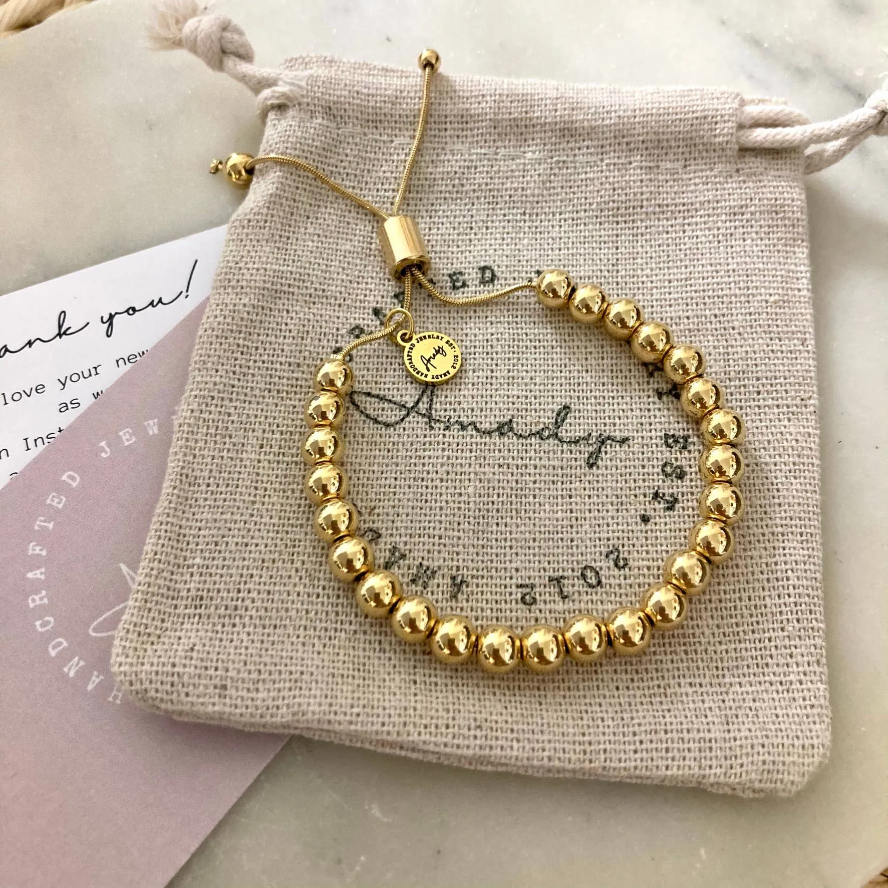 Gold beaded adjustable bracelet