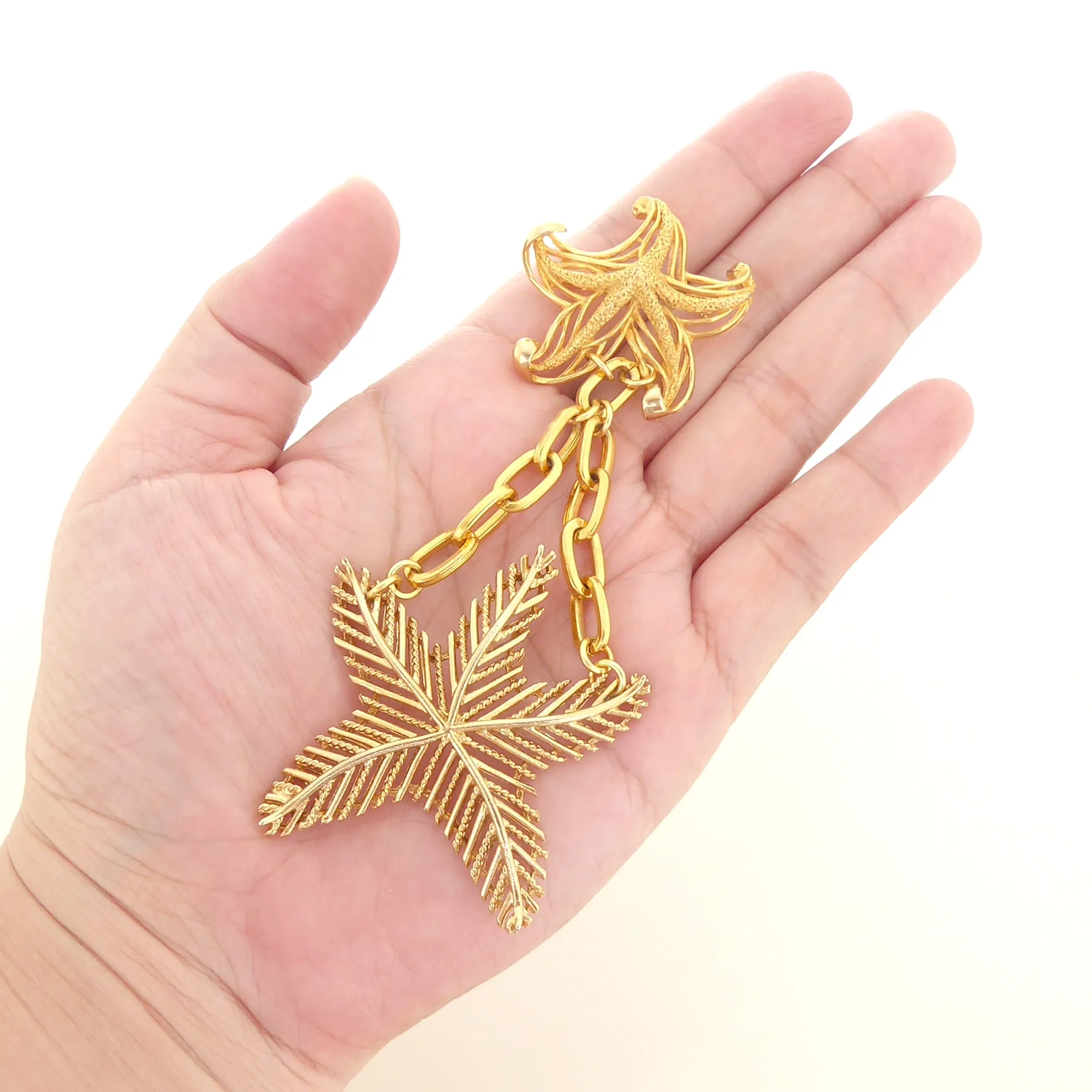 Gold starfish brooch