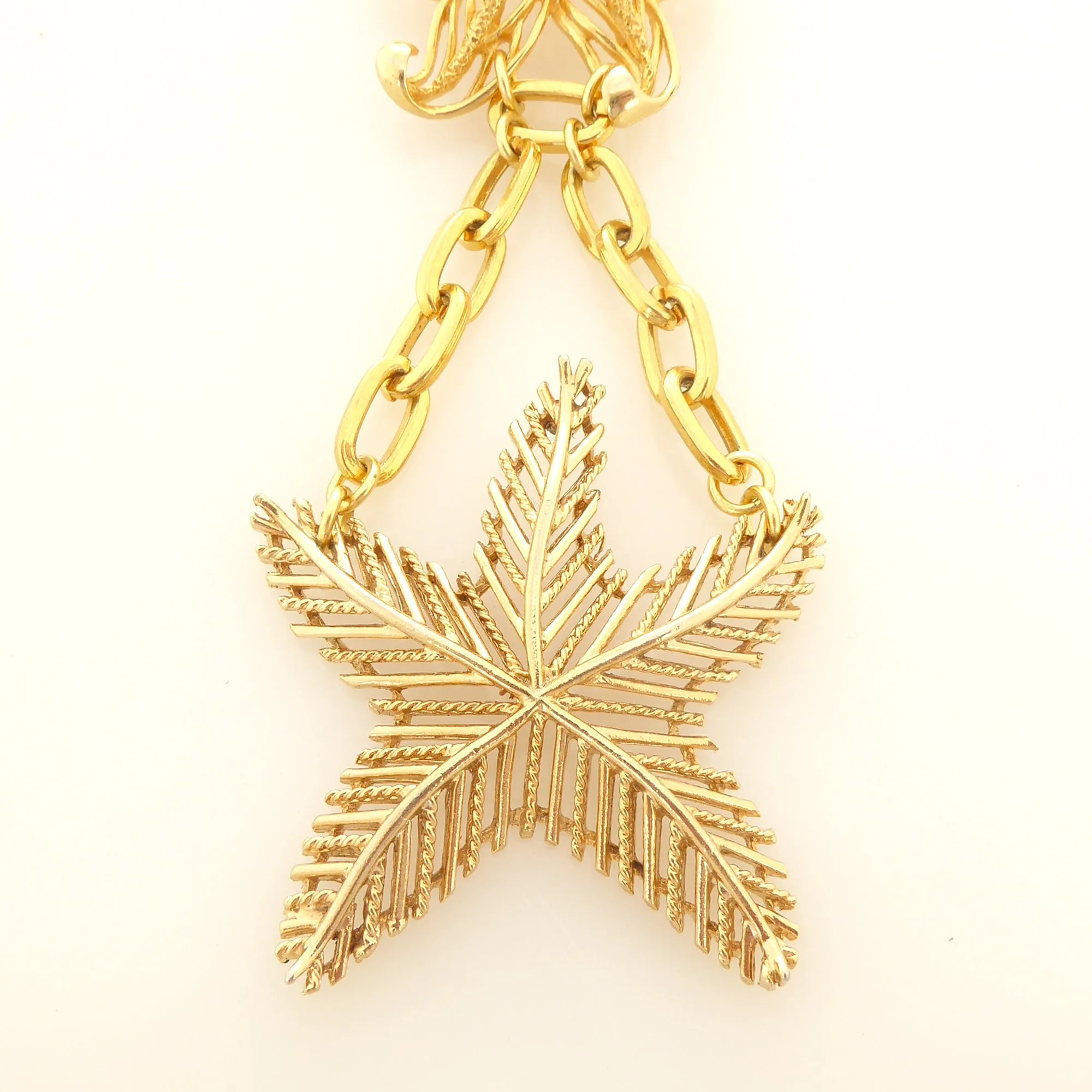 Gold starfish brooch