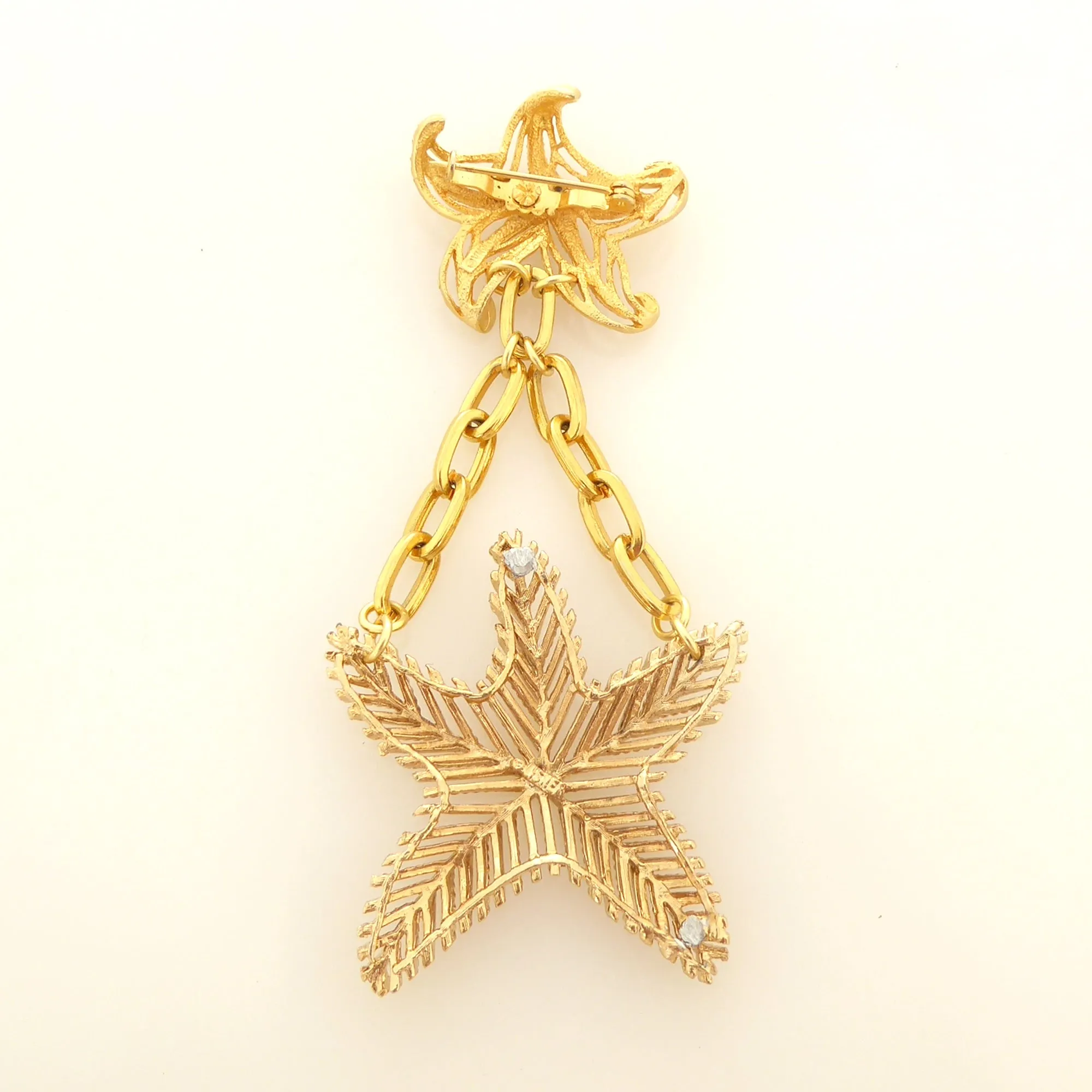 Gold starfish brooch