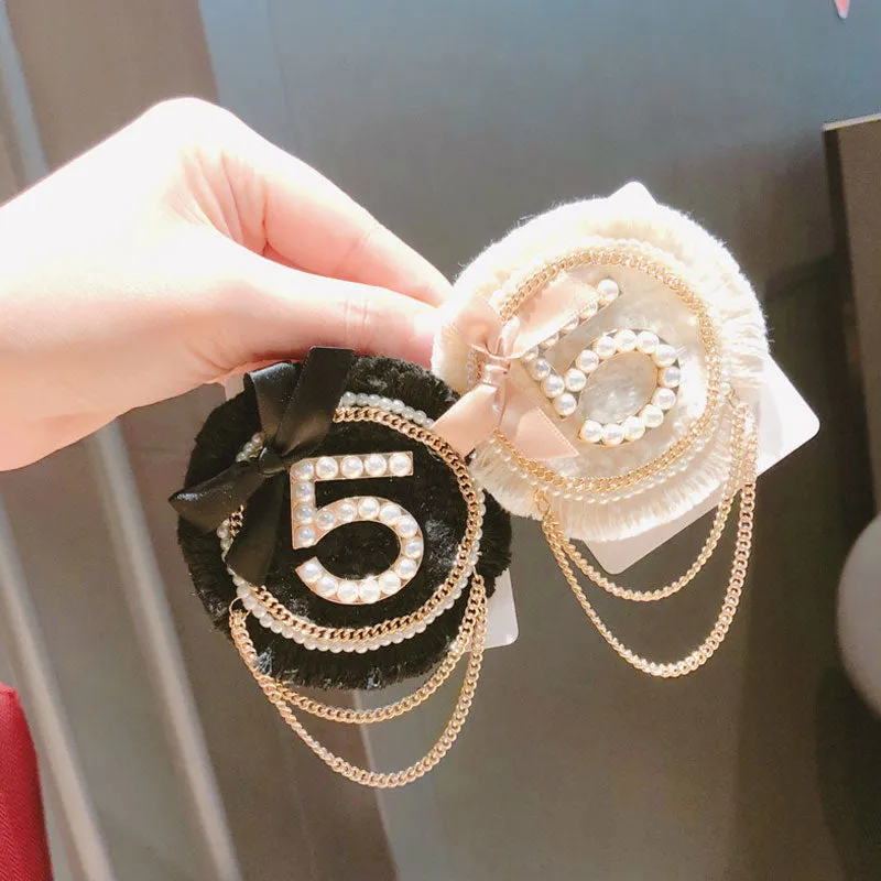 Number 5 Pearl Bow chain tassel Brooch