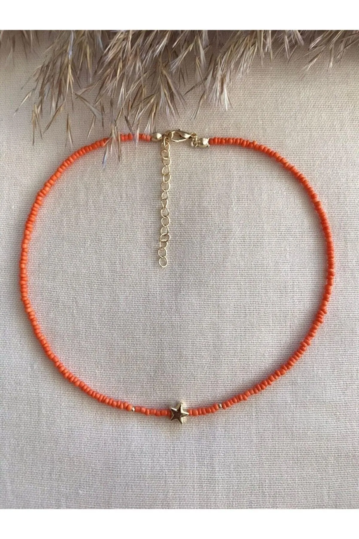 Orange Beaded Star Pendant Necklace