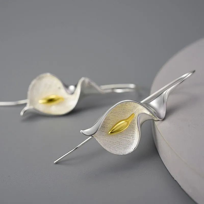 PetalPoise Dangle Earrings  |  A perfect balance of elegance and charm.