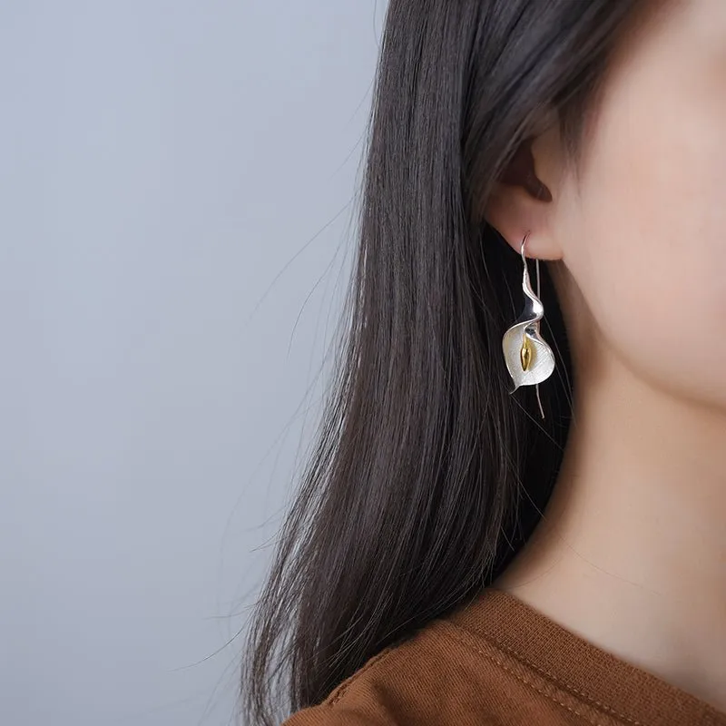 PetalPoise Dangle Earrings  |  A perfect balance of elegance and charm.