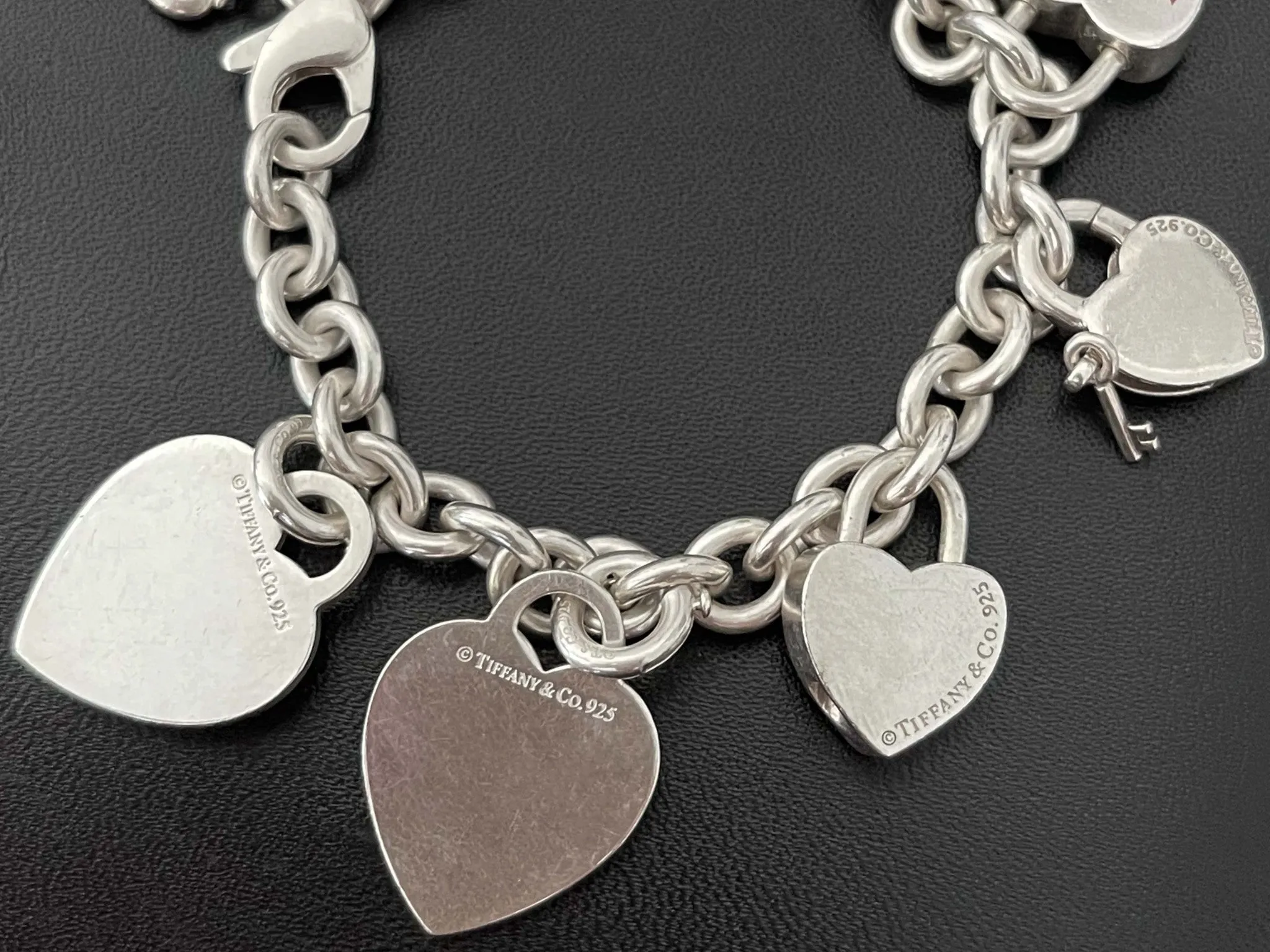 Tiffany and Co. 7 Heart Charm Bracelet Sterling Silver