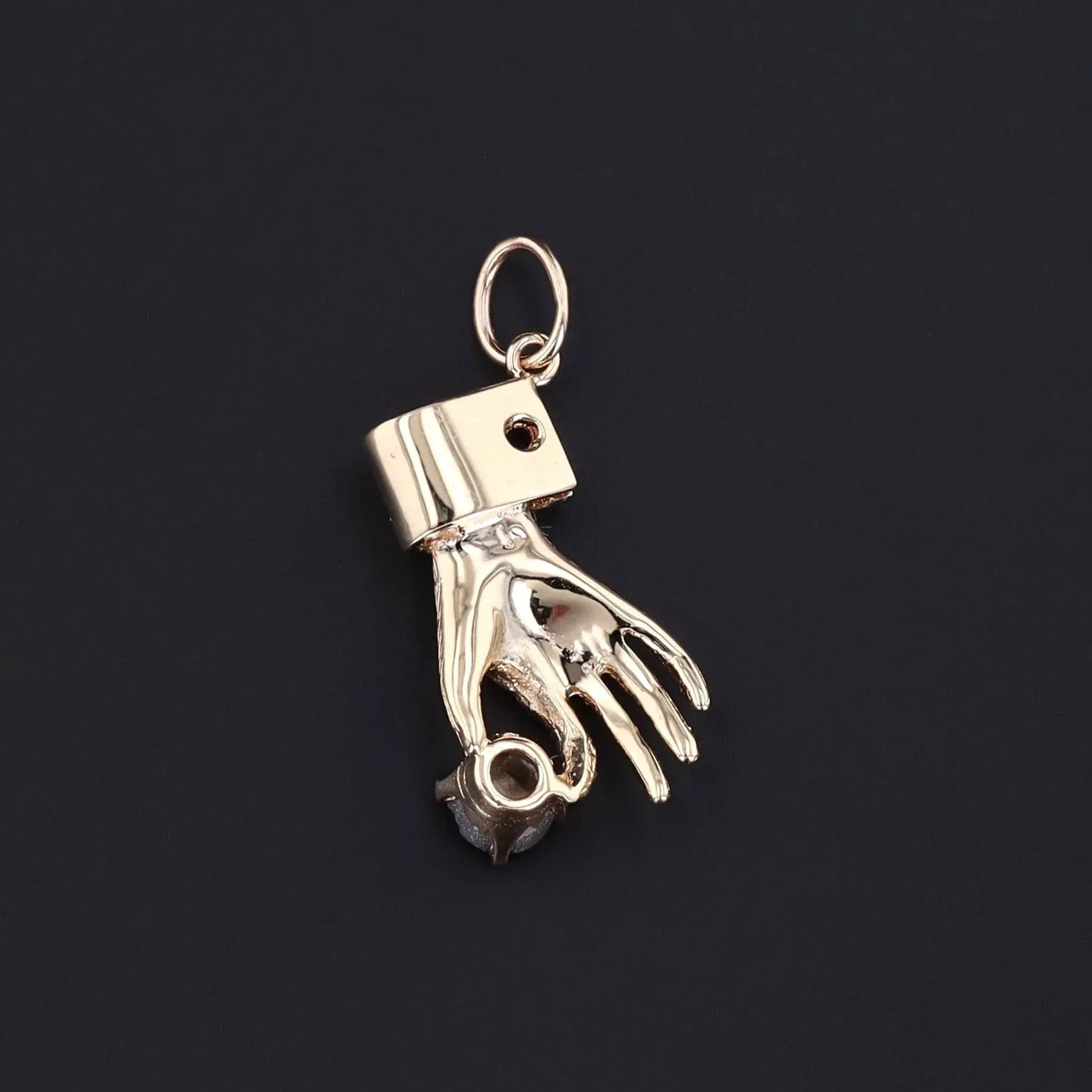 Vintage Hand Holding Gray Star Sapphire Charm of 14k Gold
