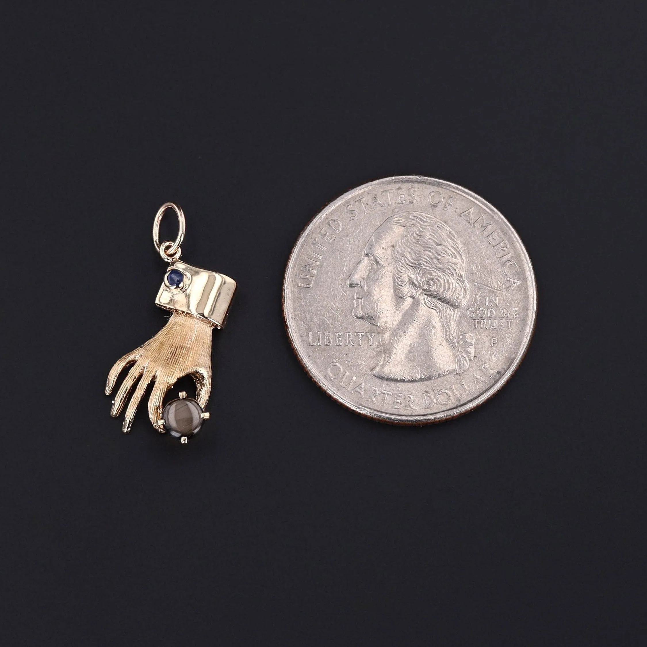 Vintage Hand Holding Gray Star Sapphire Charm of 14k Gold